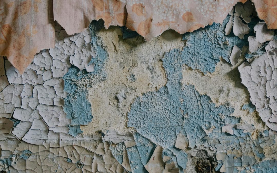 should I strip old paint before repainting